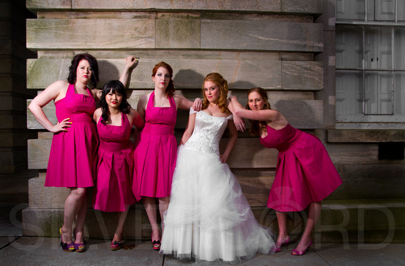 Bride and bridesmaids portrait in down town Raleigh, NC