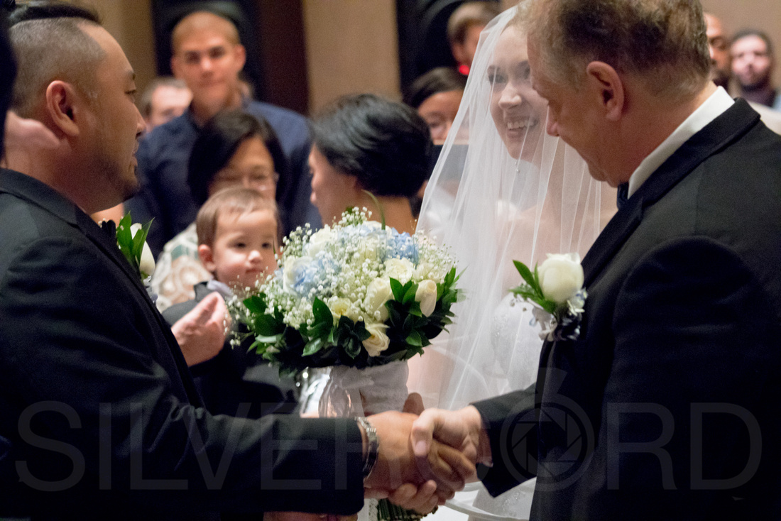Raleigh wedding photographyby photographer Siko of Silvercord Event Photography
